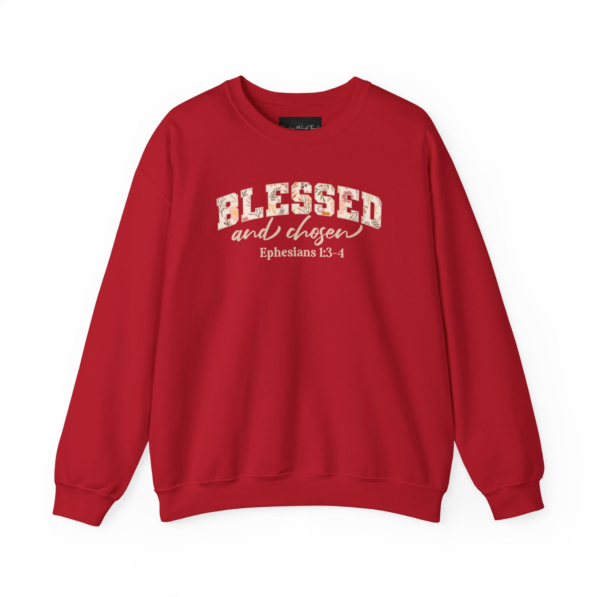 On the front of this custom Christian sweatshirt is the bible verse Blessed and Chosen Ephesians 1:3-4 with the word Blessed being in large bubble letters with a floral pattern on the inside of the letters.