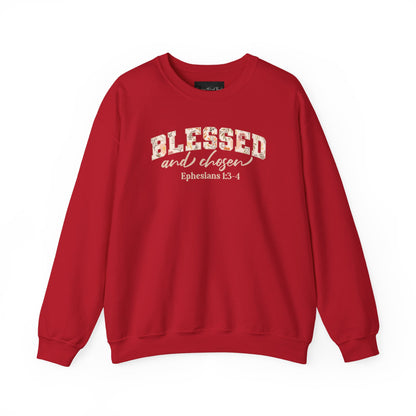 On the front of this custom Christian sweatshirt is the bible verse Blessed and Chosen Ephesians 1:3-4 with the word Blessed being in large bubble letters with a floral pattern on the inside of the letters.