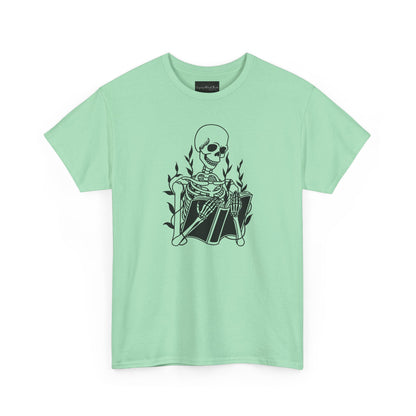On the front of this custom unisex short sleeve shirt is a large image of a skeleton reading a book, there are vines with leaves on them behind the skeleton.