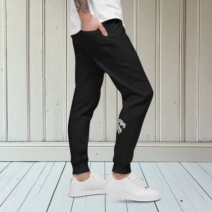 A pair of super soft custom unisex fleece sweatpants with a male lion head on the back calf of the right leg embroidered in silver.