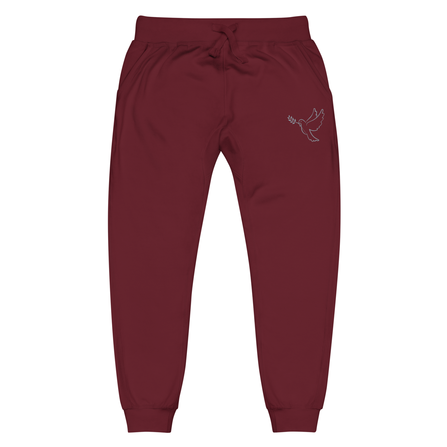 A pair of super soft ankle length unisex Christian sweatpants, there are two pockets on the front and one pocket on the back right, on the front left pocket  there is an embroidered dove with a fig leaf in silver thread.