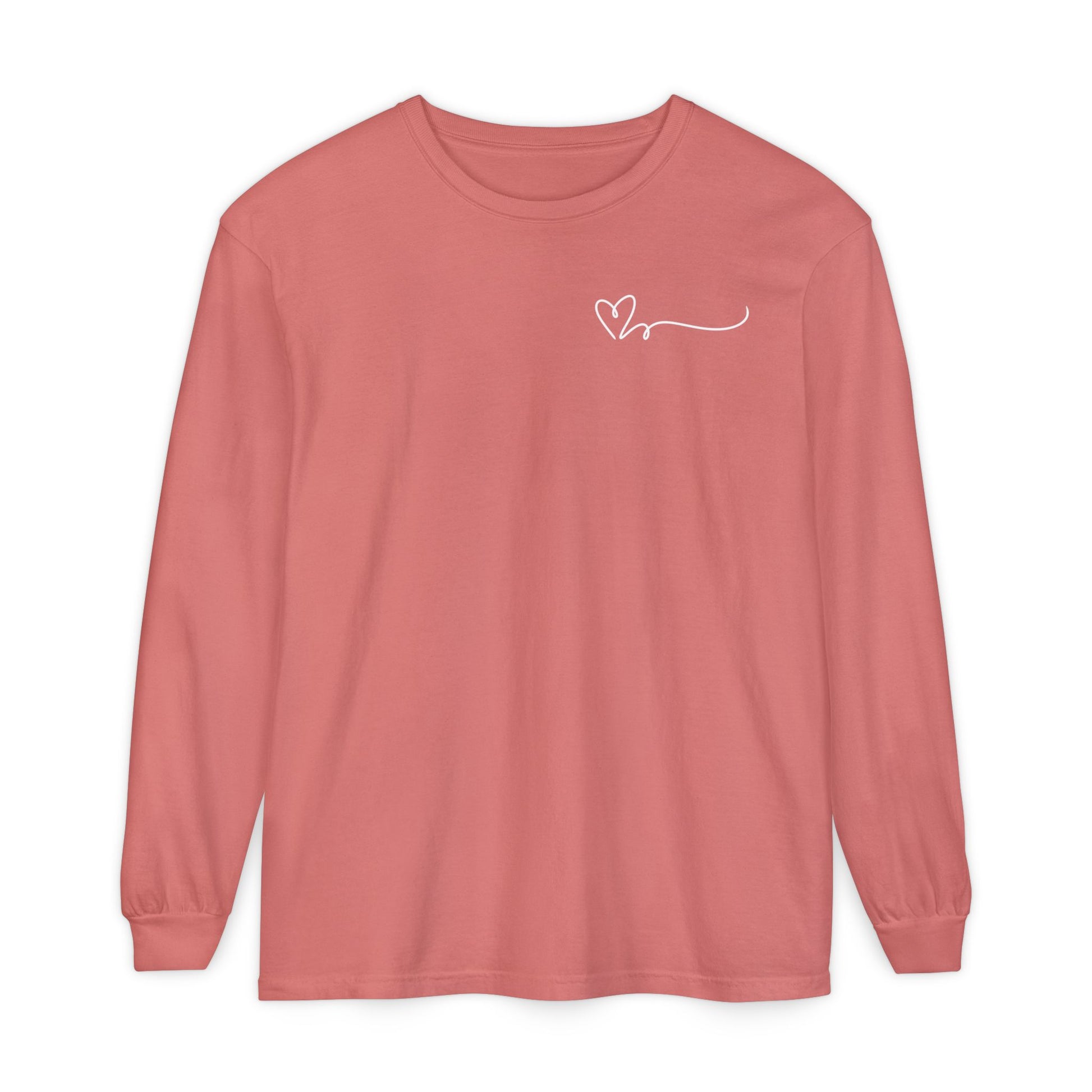 On the top right chest of this custom long sleeve t-shirt is a heart with a trail behind it signifying a heartbeat that you would see on a heart monitor. Perfect for health care workers and teachers.