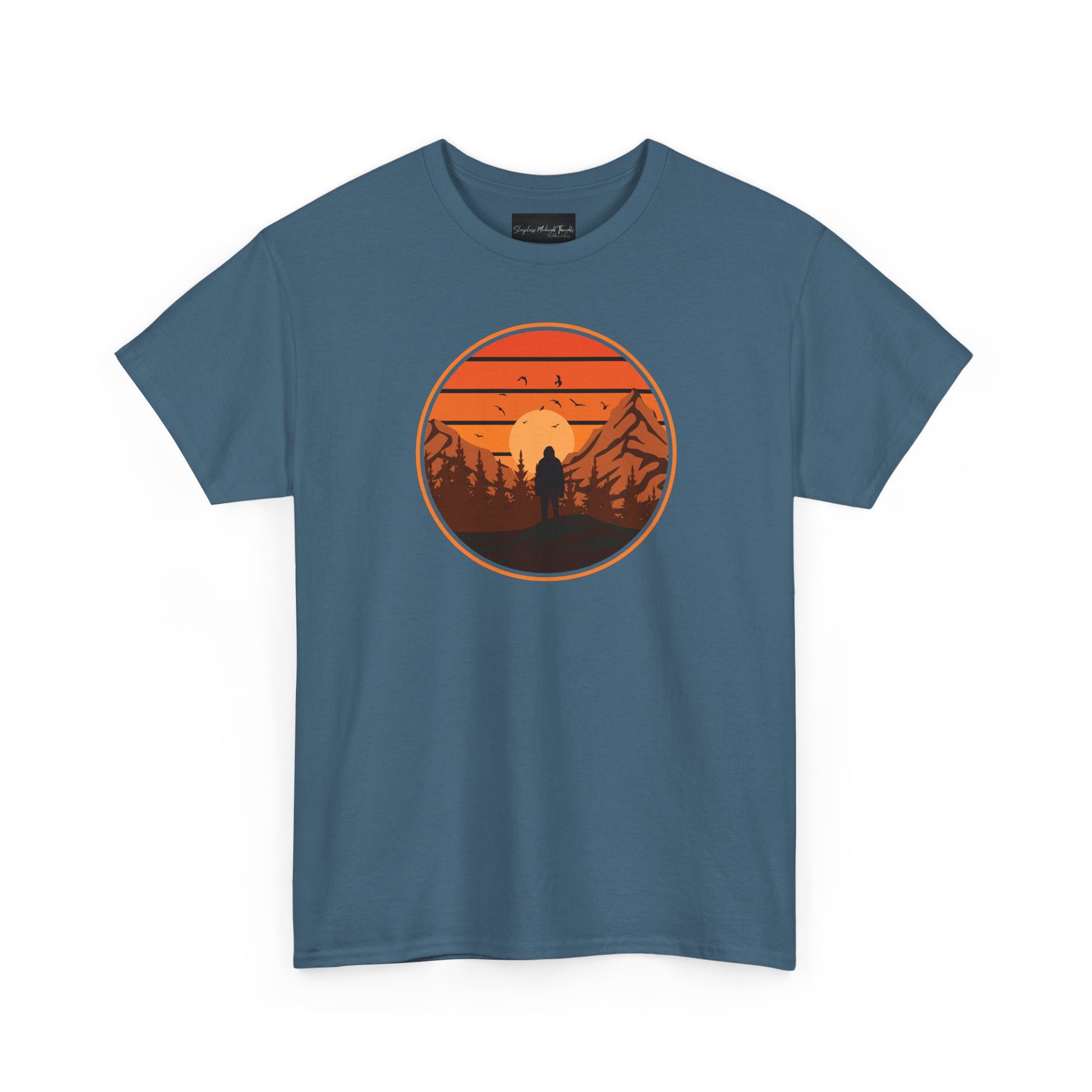 On the front of this custom tee is a large circle on the center of the chest that has an image of bigfoot right in the middle, there is a sun setting with mountain ranges and pine trees in the background.