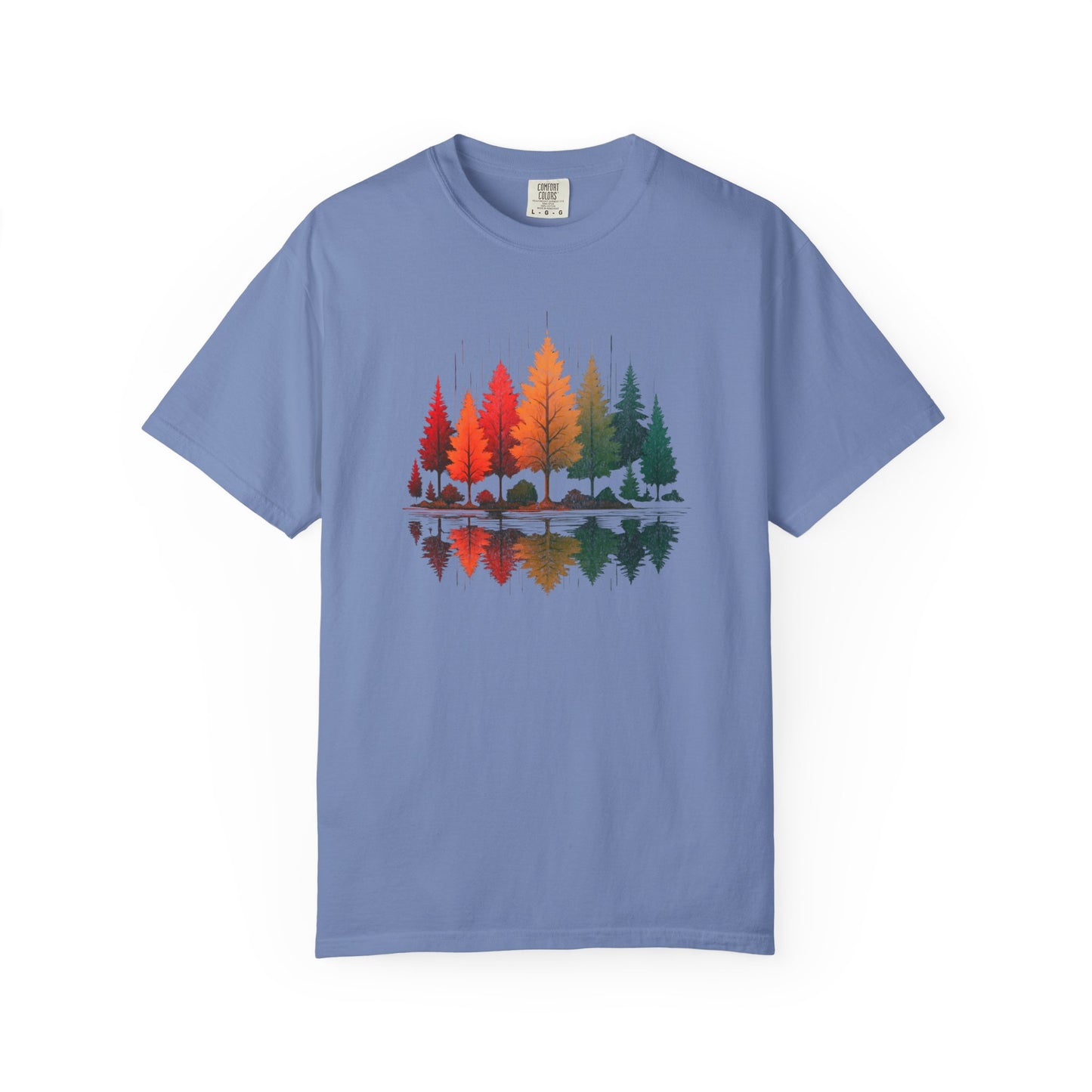On the front of this custom comfort colors short sleeve shirt is a image of trees in the fall time with all the different fall colors, the trees reflection is right underneath making them look like they are above water.