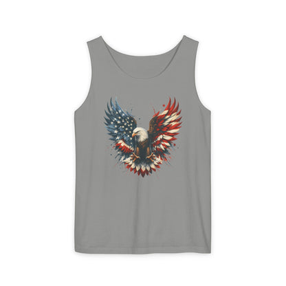 On the front of this unisex tank top is an image of an American Bald Eagle with it's wings out, the feathers of the bald eagle are the colors of the American flag being red, white and blue, there are also stars on one side of the eagle’s wings.