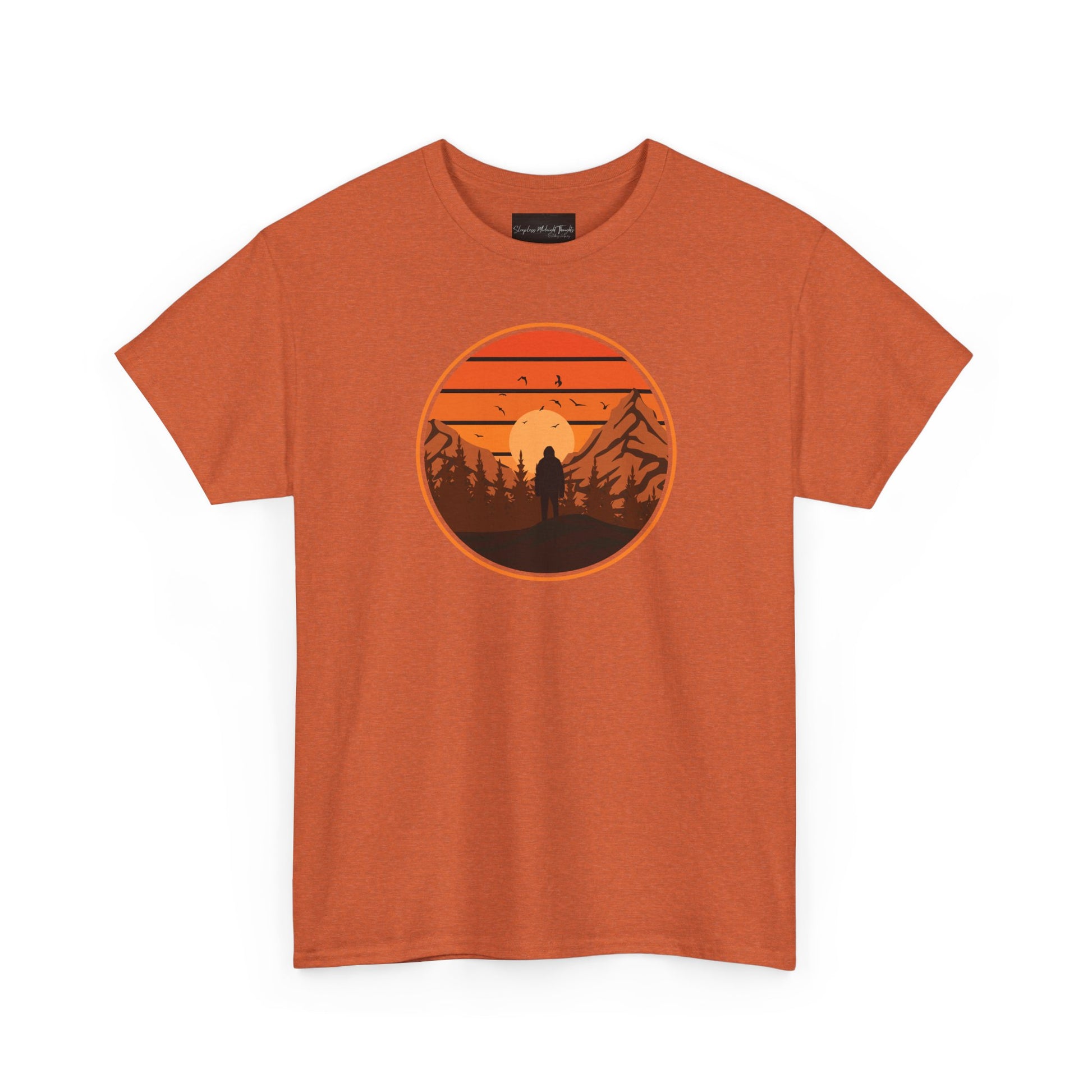 On the front of this custom tee is a large circle on the center of the chest that has an image of bigfoot right in the middle, there is a sun setting with mountain ranges and pine trees in the background.
