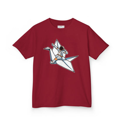 On the front of this custom kids t-shirt is an image of a astronaut flying on a paper plane.