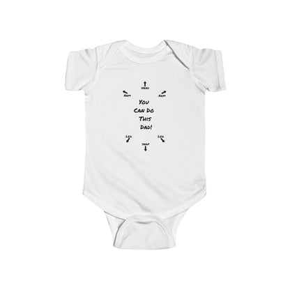 on the front of this custom infant onesie specifically meant for dads, are the words You can do this dad with arrows pointing where each leg and each arm goes along with were the babies head goes and where to close the snaps, a perfect diagram for a new father on how to put a onesie on a baby.
