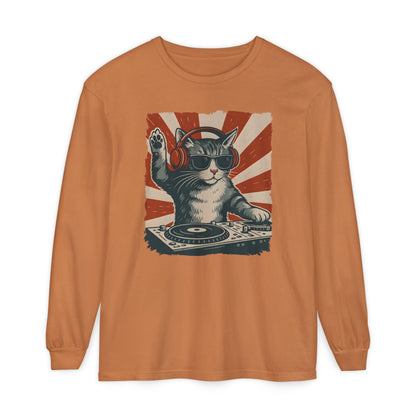 On the front of this custom retro long sleeve shirt is a DJ playing music, except the DJ is a cat that is wearing headphones, there is a vintage red and ivory background behind the cat.