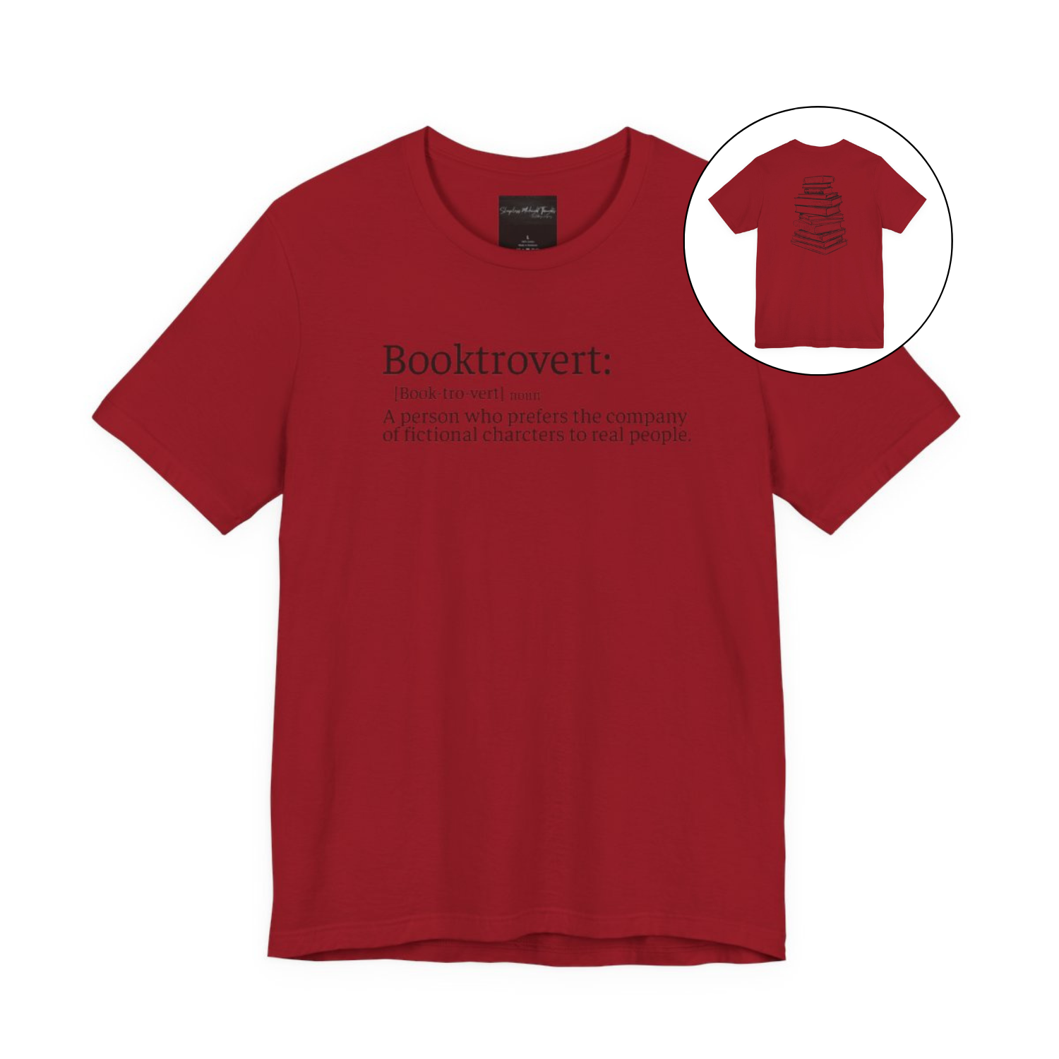 On the front of this custom unisex short sleeve shirt is the word booktrovert with the definition of the word underneath, on the back of the shirt is an image of a large stack of books.