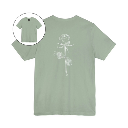 On the back of this custom women's short sleeve shirt is a large rose from the top to the bottom in the center of the back.