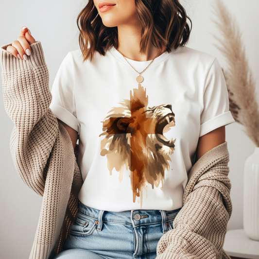 On the front of this custom unisex Christian short sleeve shirt is an image of a male lion with roaring with a Jesus cross super imposed overtop, both the lion and the cross are dripping like they have been spraypainted onto the shirt.