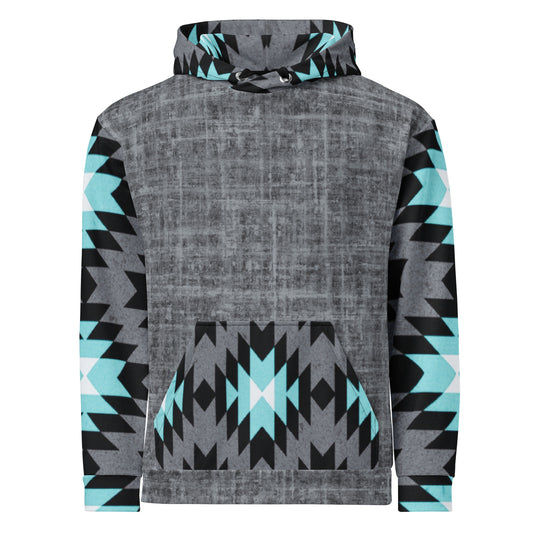 A custom unisex handmade hoodie with the front and the back of the hoodie being a washed grey pattern with the sleeves, hood and the front kangaroo pocket is a blue, black, grey and white Aztec western pattern that really pop next to the grey.
