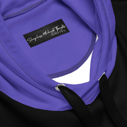 This custom handmade hoodie has a unique color block design with the front and back of the hoodie being black, the sleeves, front pocket and the hood of the sweater are all a dark ocean blue in color.