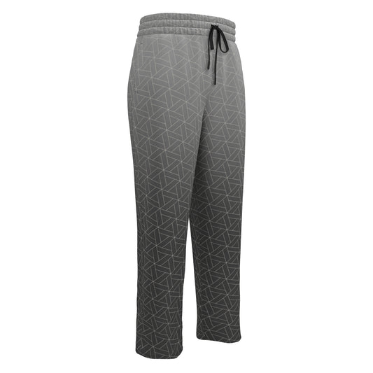 A pair of custom wide leg grey ombre wide leg joggers, it starts as a lighter grey at the top then fades to a dark grey at the bottom, there is a white diamond pattern overlayed on the top of the pants.