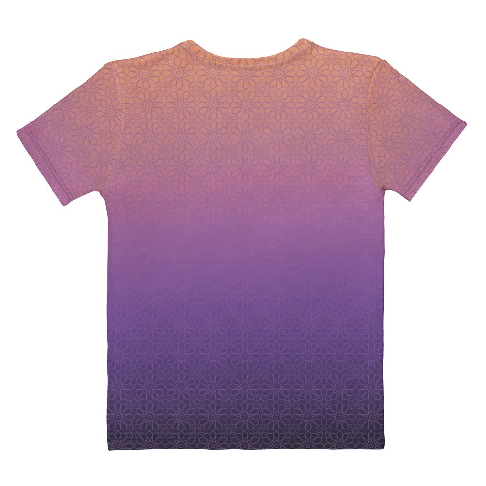 This completely custom handmade women's short sleeve tee has an ombre floral pattern with the shirt being a peach color at the neckline then fading to a lilac purple in the middle then a dark purple at the bottom, there is a lilac purple floral pattern overlayed across the top of the ombre design.
