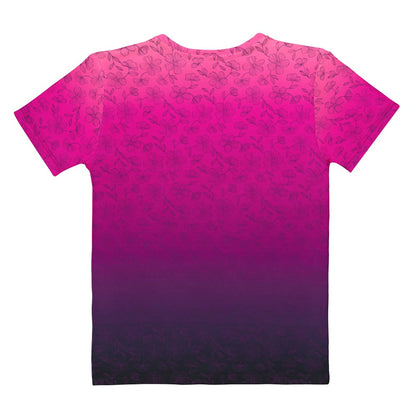 This super soft custom handmade women's tee features an ombre floral design with the top of the shirt being a bright peach color then it fading to a hot pink then it fades to a dark purple at the very bottom of the shirt, there is a dark purple floral pattern overlayed on top then fades into the bottom of the shirt.