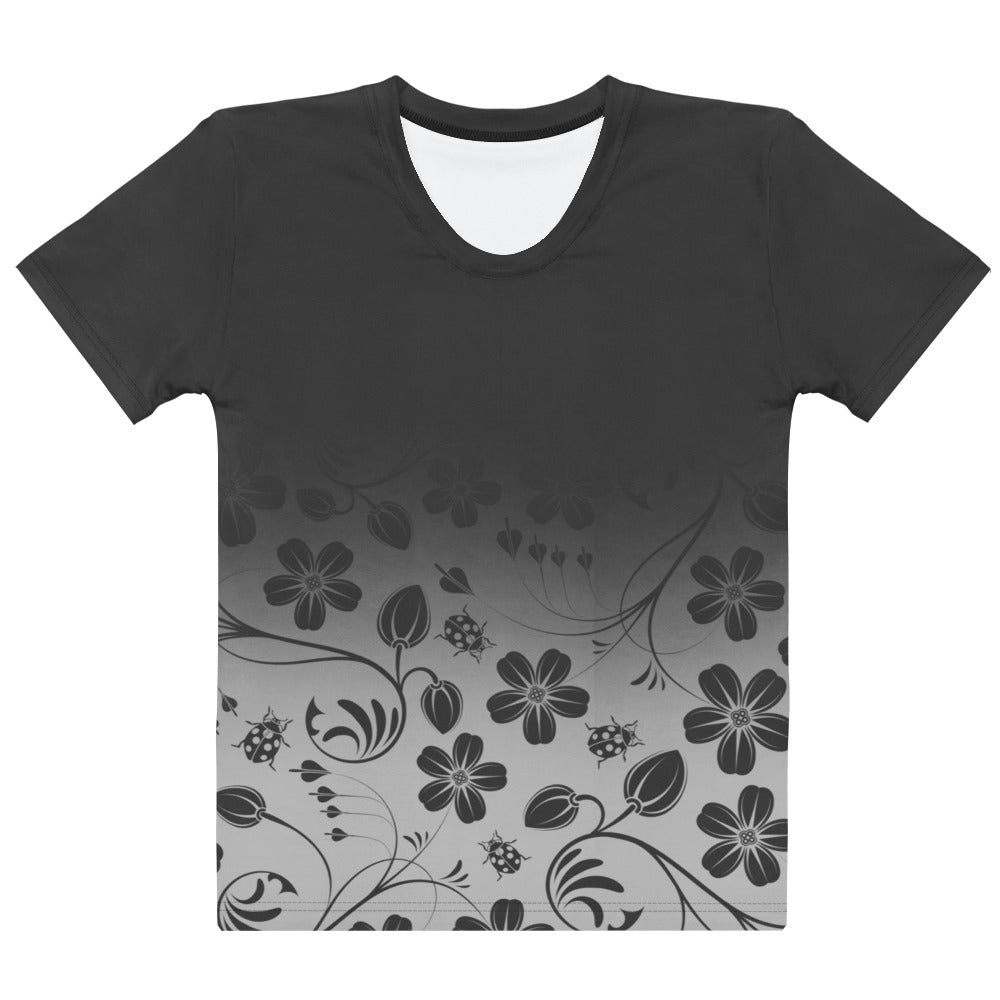 This custom handmade women's short sleeve tee has a ombre design with the top of the shirt being a dark slate grey, then fading to a light grey at the waistline, there is a floral design with flowers and leaves overlayed on the top of the ombre pattern at the bottom that is in the same color of dark slate as on the top.