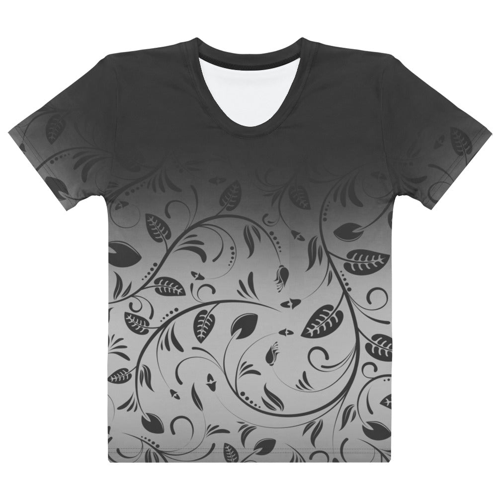 This custom women's handmade tee has a ombre pattern with the top of the shirt being a slate grey color then fading to a light grey at the waistline, there is a floral design with leaves and vines overlayed over the ombre pattern, the leaves are the same color as the dark slate color at the top of the shirt.