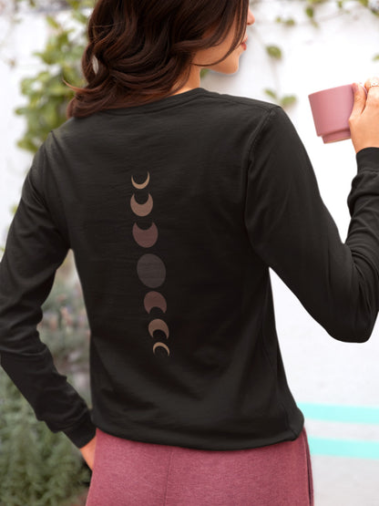 On the back of this custom unisex long sleeve t-shirt from the top of the shirt to the bottom are 7 images of the moon showing the moons cycle, every moon is a different shade of brown.