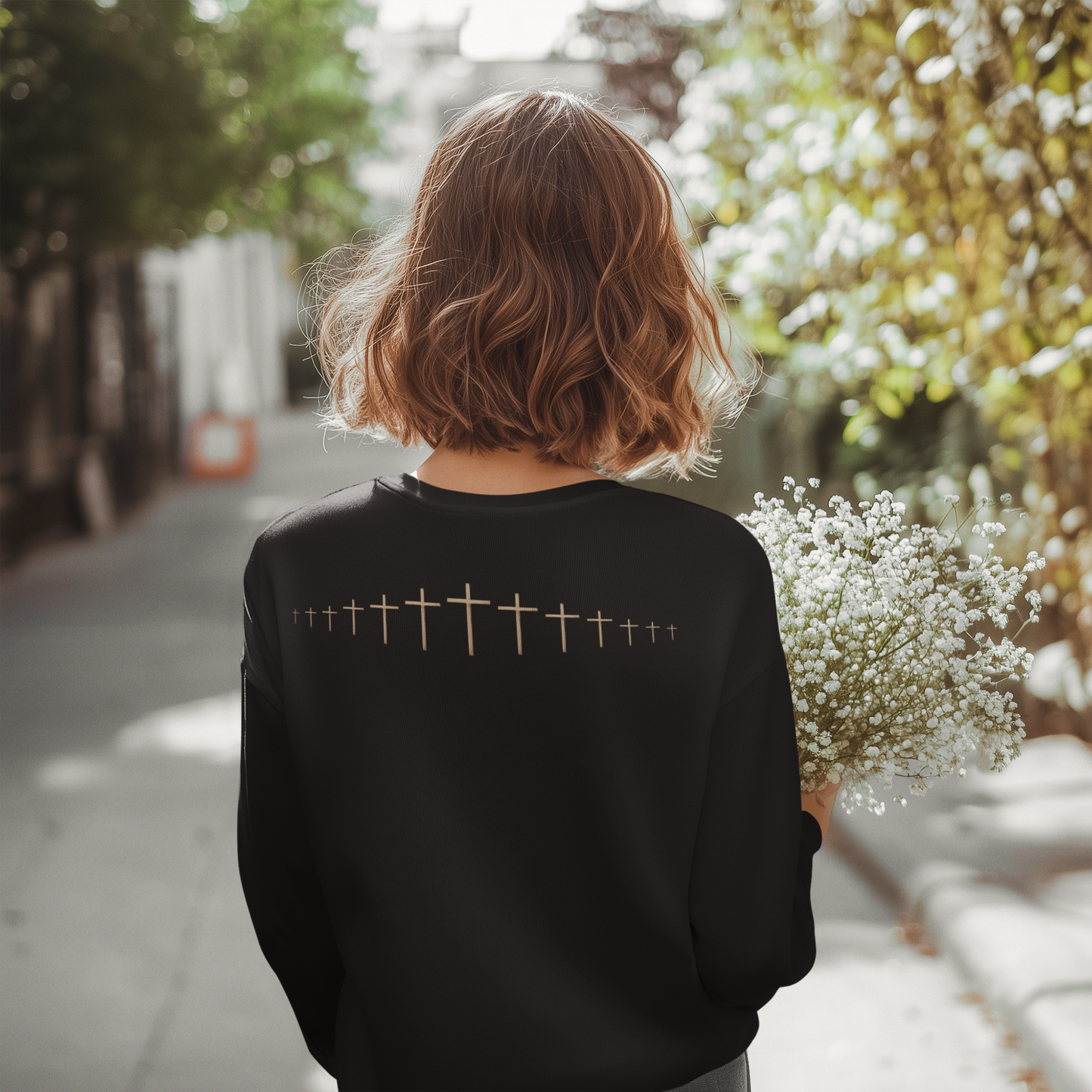 On the back of this Christian long sleeve shirt is a large wooden Jesus cross in between the shoulder blades, the Jesus cross then keeps getting smaller and smaller till it fades right off the shirt giving it a amazing 3D look on the back.