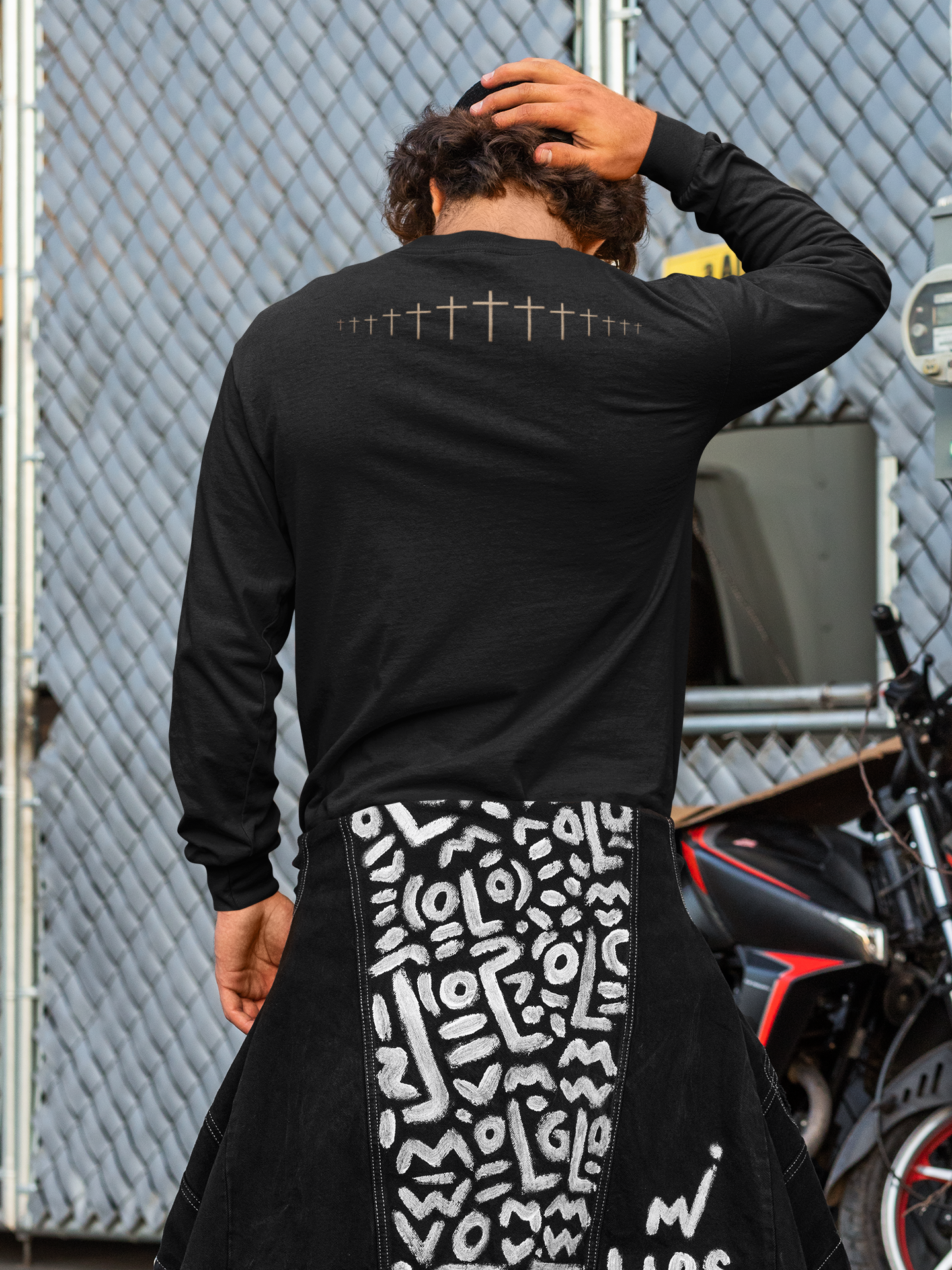 On the back of this Christian long sleeve shirt is a large wooden Jesus cross in between the shoulder blades, the Jesus cross then keeps getting smaller and smaller till it fades right off the shirt giving it a amazing 3D look on the back.