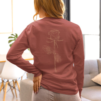 On the back of this custom women's long sleeve tee is a beige colored long stem rose that is the length of the shirt