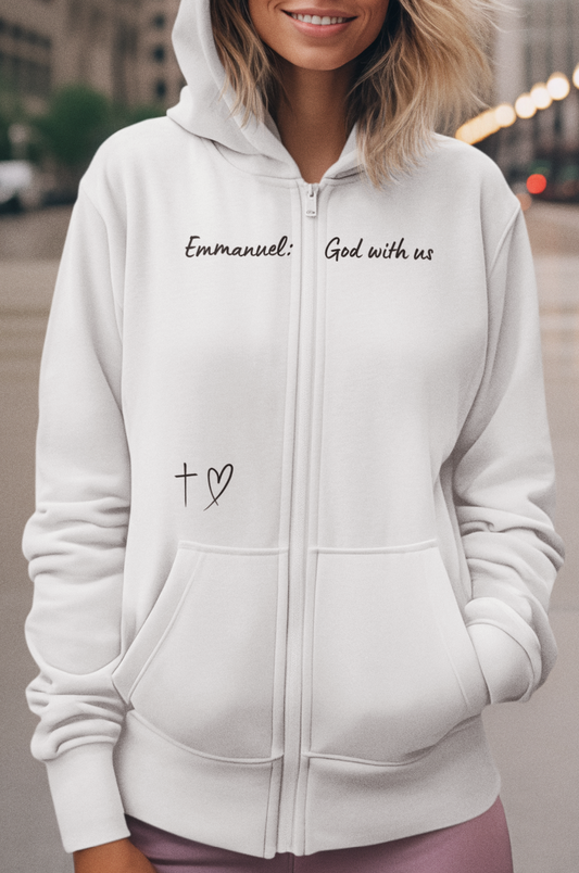 This Unisex Heavy Blend™ Full Zip Hooded Sweatshirt features the words Emmanuel God With Us on the upper chest and an image of a cross with a heart above the pocket.