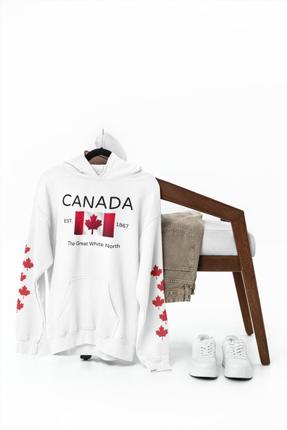 On the front of this custom unisex patriotic sweater is a Canadian flag that looks like it is flying in the wind, the words Canada The Great White North are underneath the flag with the word Est on the right side of the flag with the number 1867 being on the left side of the flag. Each are has red maple leaves that run down each sleeve to the cuff.