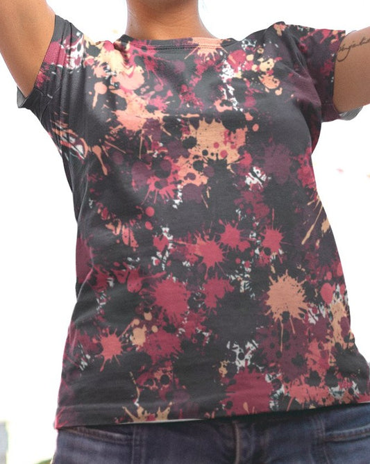 This completely custom super soft handmade women's t-shirt is all black with a bunch of different color paint splashes all over the shirt from red, pink, peach, burgundy, maroon and white. This shirt is perfect for painters or people who love art