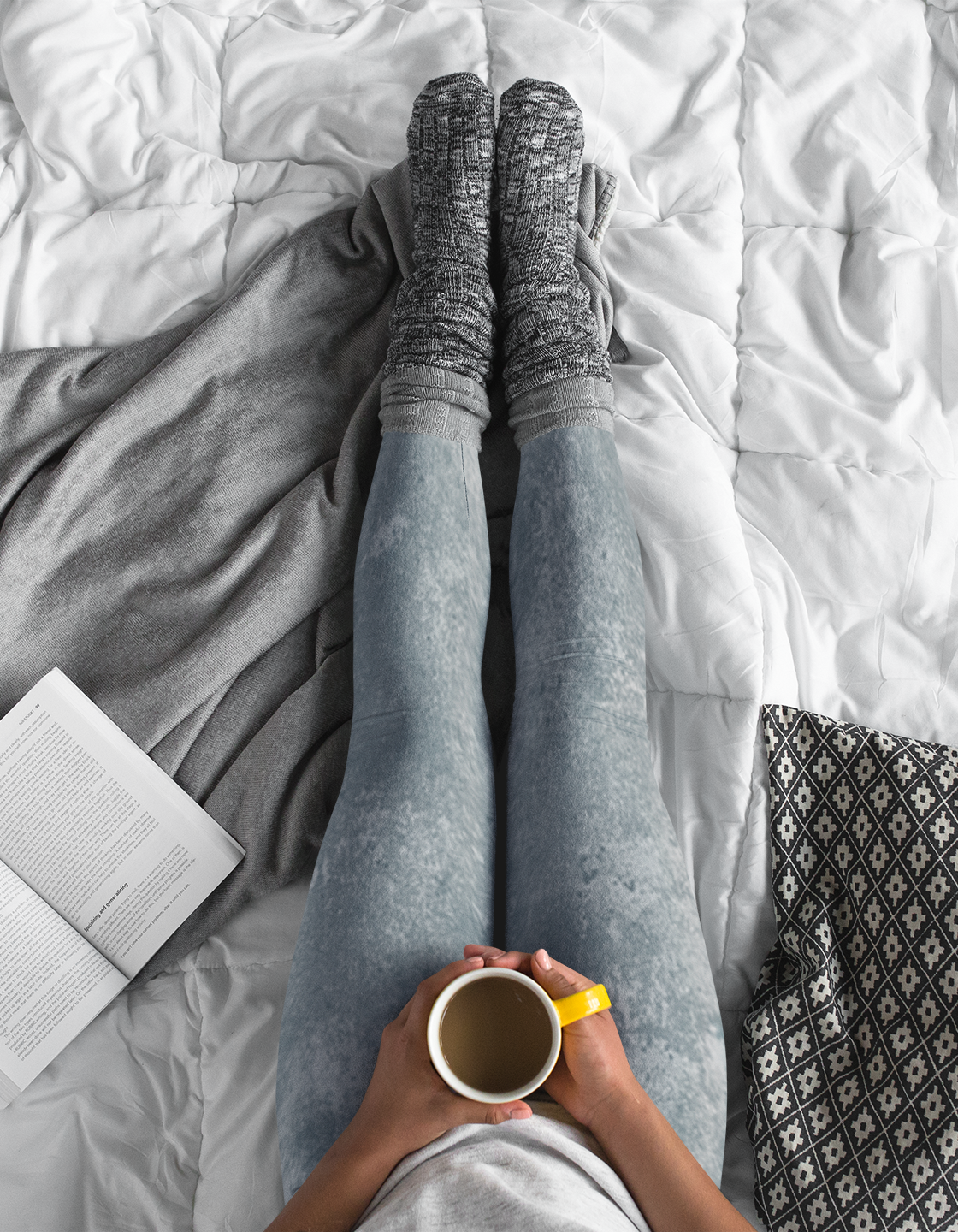 A pair of women's custom high waisted leggings, they have a washed grey pattern all over the pants.