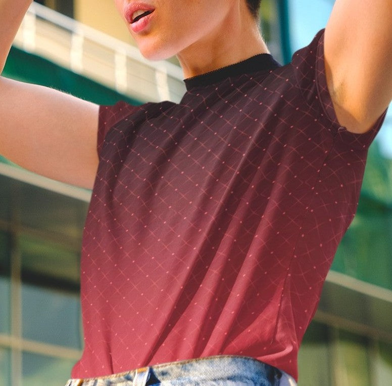 This completely custom women's shirt has a ombre pattern with it starting as a deep crimson red at the neckline of the shirt then fading to a bright red at the waistline, there is a crisscross pattern overlayed on the top in a light red color that makes the design look like it is glowing.