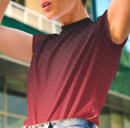 This completely custom women's shirt has a ombre pattern with it starting as a deep crimson red at the neckline of the shirt then fading to a bright red at the waistline, there is a crisscross pattern overlayed on the top in a light red color that makes the design look like it is glowing.