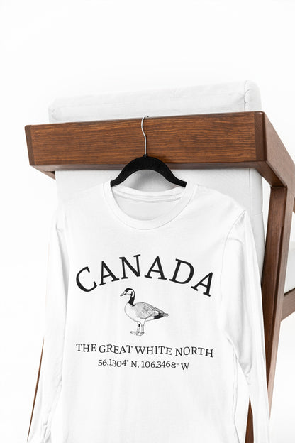 This custom Canadian made unisex long sleeve t-shirt features a Canadian goose on the front in the center of the shirt with the words 'Canada'  above it and 'The Great White North' under the goose, on the back left shoulder blade of the long sleeve shirt is a maple leaf.