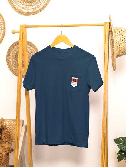 On the front pocket of this custom shirt is a Canadian flag with the words Made in Canada underneath the flag.