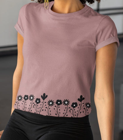 This completely custom handmade super soft women's short sleeve tee can be fully personalized with you able to choose whatever color of shirt you would prefer along with the floral daisy design in black along the entire bottom of the t-shirt.