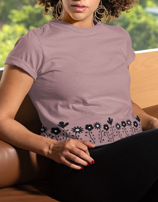 This completely custom handmade super soft women's short sleeve tee can be fully personalized with you able to choose whatever color of shirt you would prefer along with the floral daisy design in black along the entire bottom of the t-shirt.