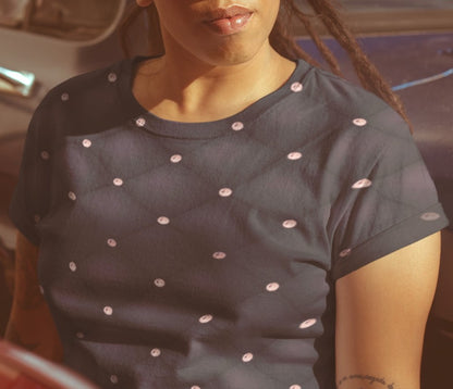 This custom handmade women's t-shirt is an eggplant purple color in a quilted pattern with diamonds on each intersecting line. The lines are a darker shade eggplant giving the shirt a 3d design.