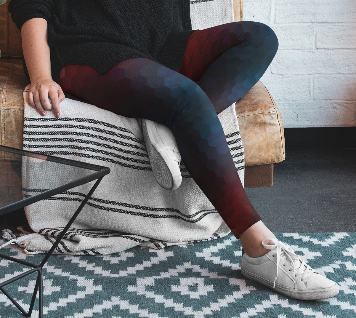 These custom high waisted women's leggings have an burgundy and teal octagon pattern throughout the entire pant that makes them look 3D with the colors shifting from lighter to darker in shade.