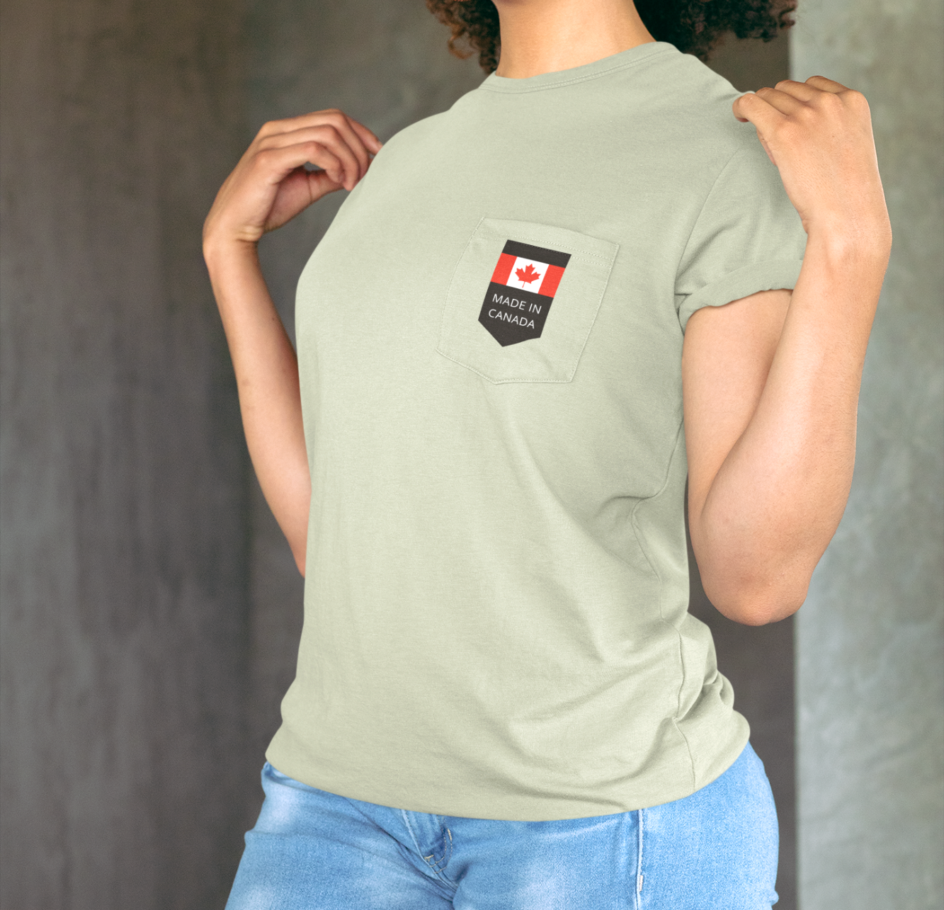 On the front pocket of this custom shirt is a Canadian flag with the words Made in Canada underneath the flag.