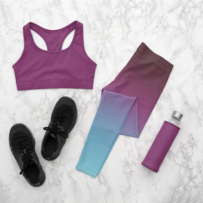 These custom handmade high waisted women's leggings have a ombre pattern with the top of the leggings being a deep purple in color then it fading to a bright turquoise blue at the bottom.