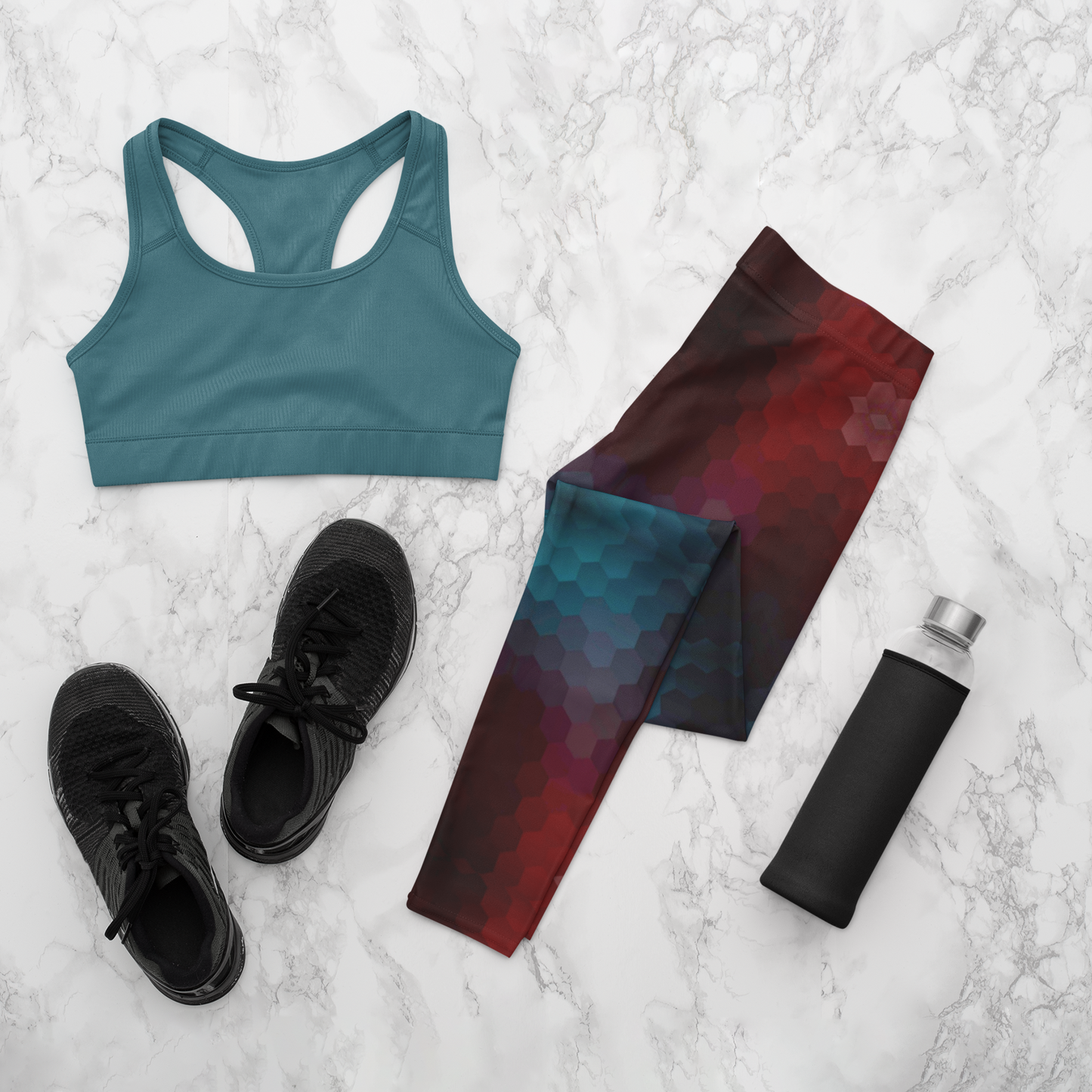 These custom high waisted women's leggings have an burgundy and teal octagon pattern throughout the entire pant that makes them look 3D with the colors shifting from lighter to darker in shade.