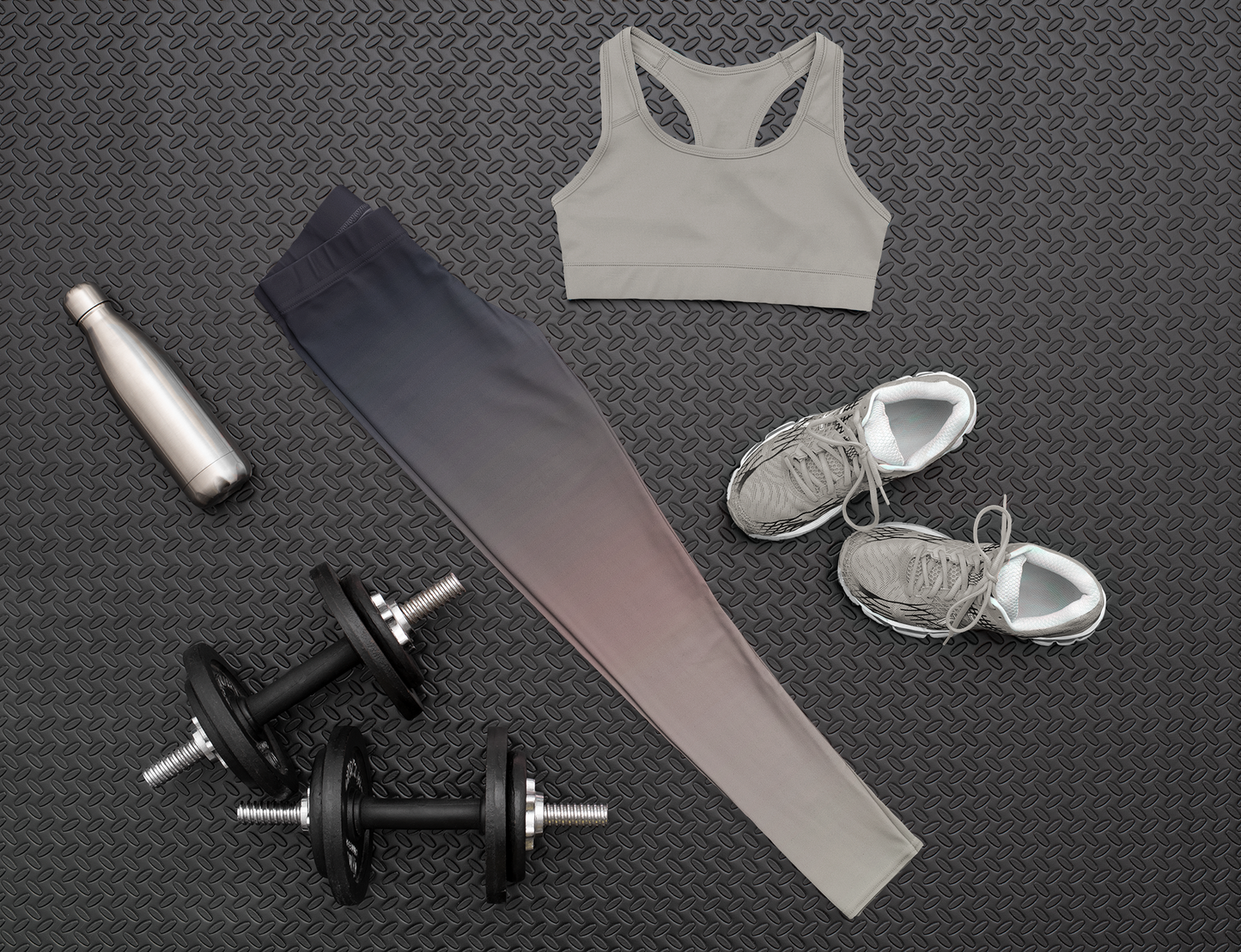 A pair of women's custom high waisted leggings that have an ombre pattern that starts as black at the top of the leggings then fades to a light pink in the middle then to a beige at the bottom of the pants.