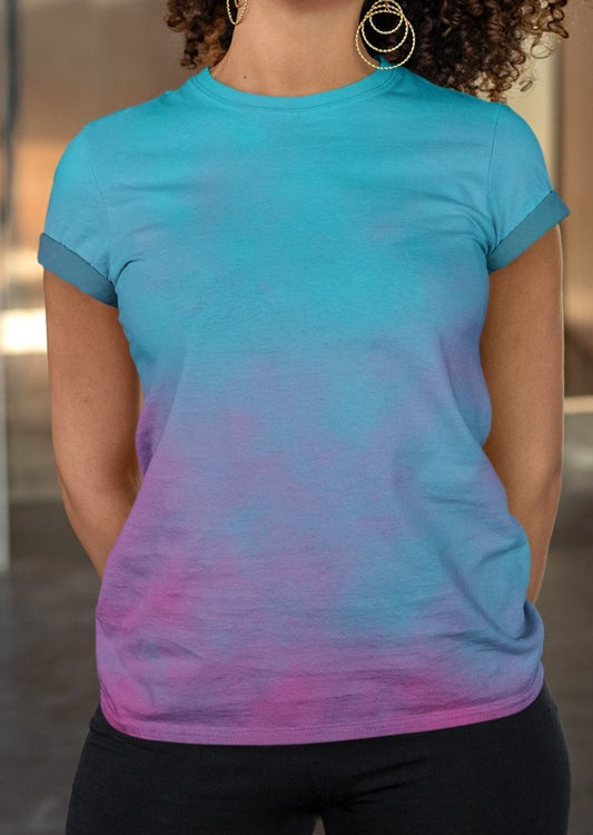 This super soft custom handmade women's t-shirt is a vibrant ocean blue with a hot pink smoke design overlayed coming from the bottom of the shirt and fading to the top.