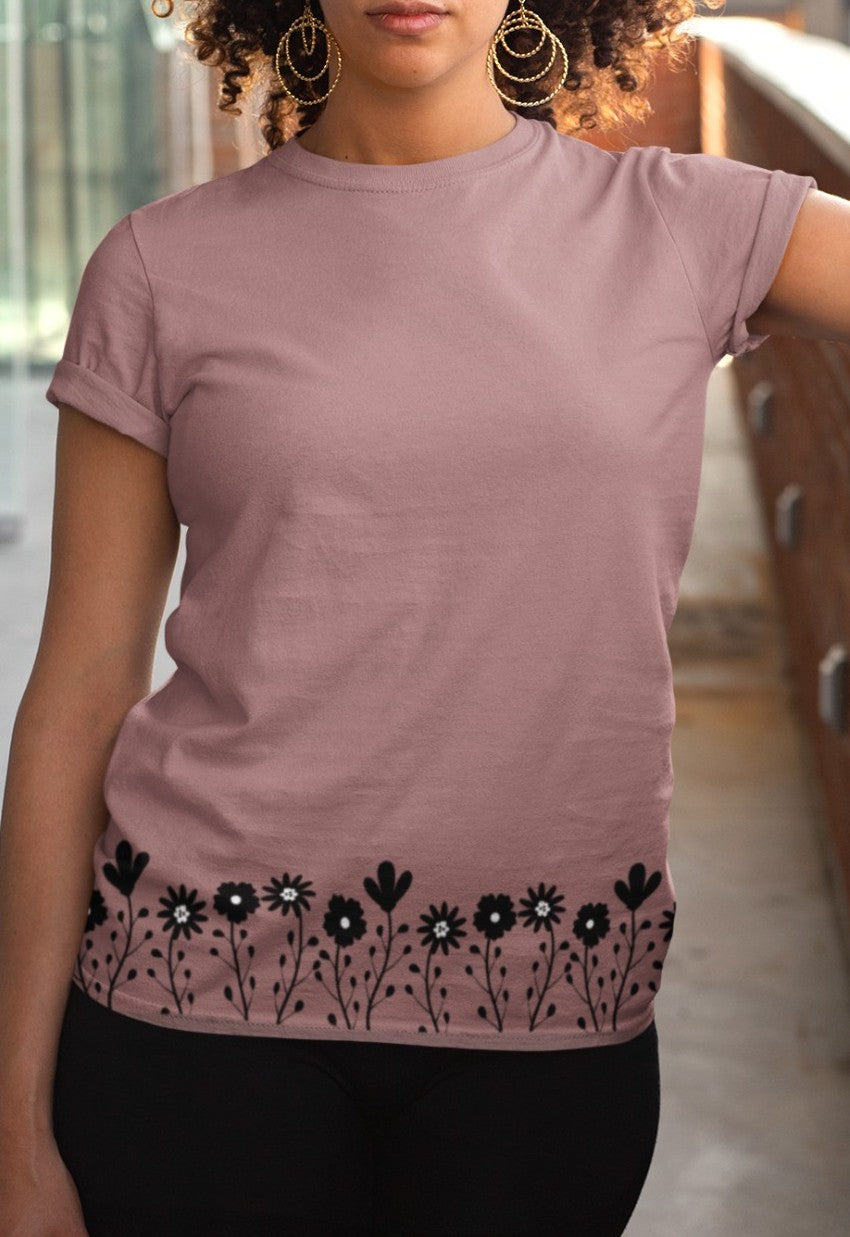 This completely custom handmade super soft women's short sleeve tee can be fully personalized with you able to choose whatever color of shirt you would prefer along with the floral daisy design in black along the entire bottom of the t-shirt.