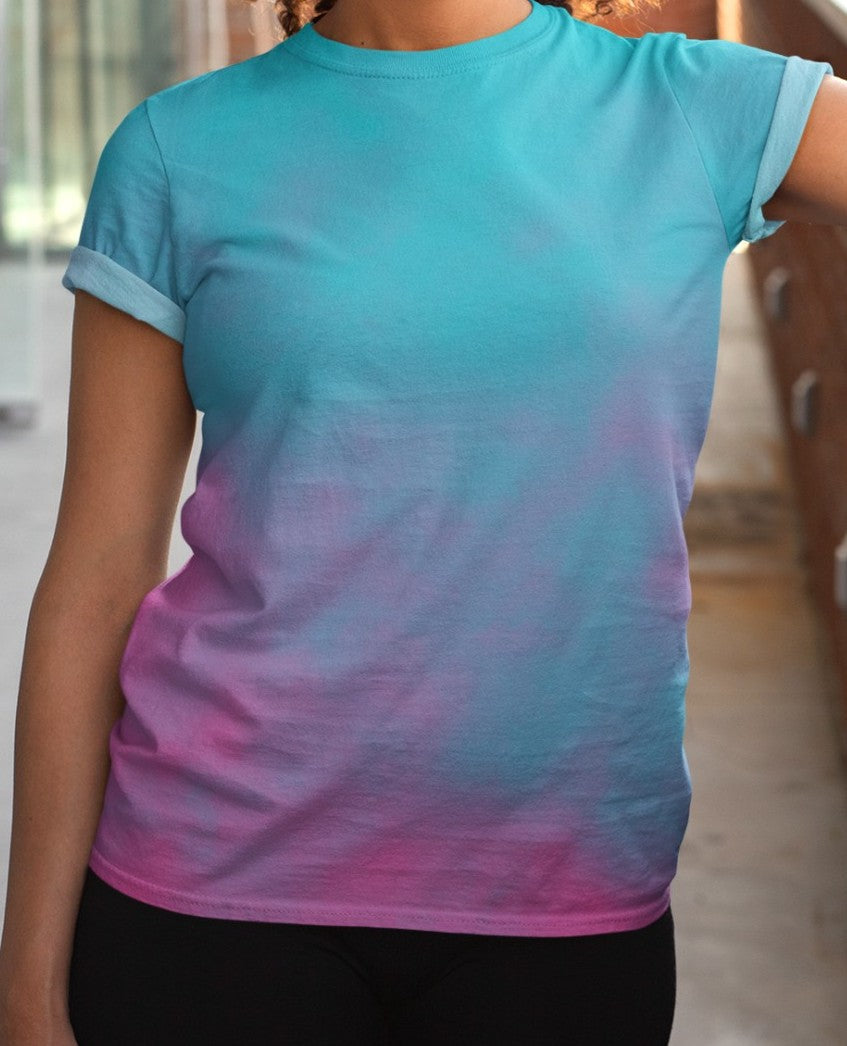 This super soft custom handmade women's t-shirt is a vibrant ocean blue with a hot pink smoke design overlayed coming from the bottom of the shirt and fading to the top.