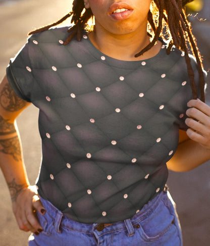 This custom handmade women's t-shirt is an eggplant purple color in a quilted pattern with diamonds on each intersecting line. The lines are a darker shade eggplant giving the shirt a 3d design.