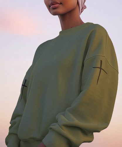On this custom Christian pullover sweatshirt there are two Jesus crosses, one on either shoulder of the sweater.