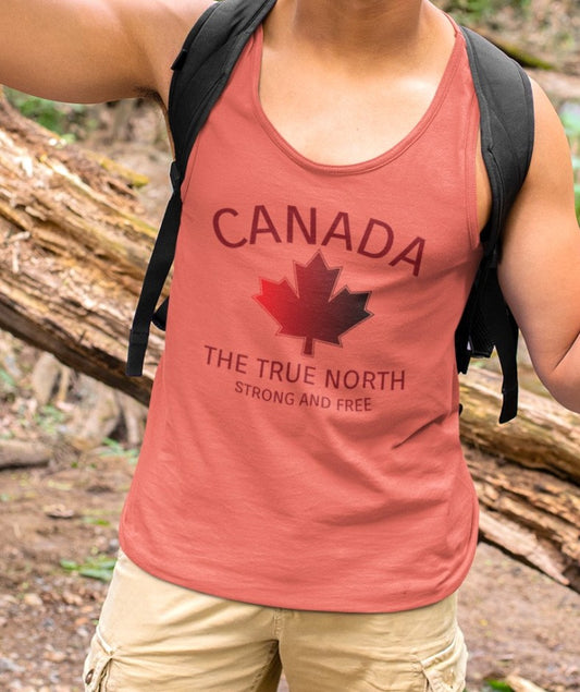 This custom unisex tank top has the word Canada in large block letters in a half circle on the top with a maple leaf underneath that, then under the the maple leaf are the words The True North Strong And Free in the same font, everything is a bright red color like the Canadian flag.