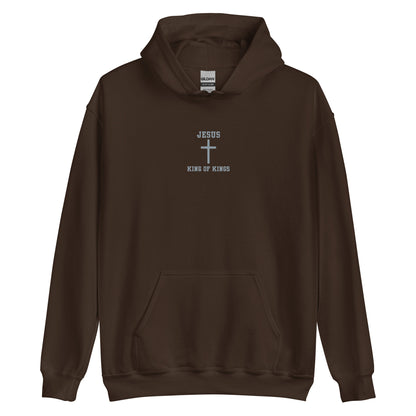 On the front of this custom embroidered unisex hooded sweatshirt are the words Jesus King of Kings with a Jesus cross in the center embroidered into the upper middle of the hoodie in silver thread.
